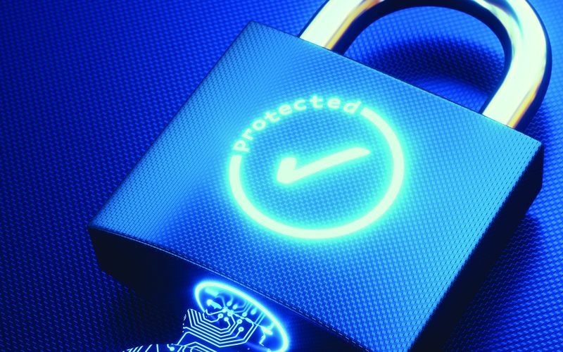 A glowing padlock over a circuit board